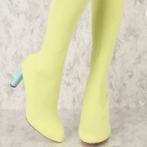 Yellow thigh high boots